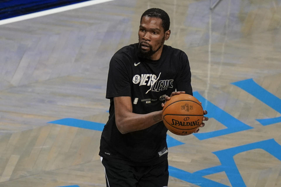 Brooklyn Nets' Kevin Durant warms up before Game 7 of a second-round NBA basketball playoff series Milwaukee Bucks, Saturday, June 19, 2021, in New York. (AP Photo/Frank Franklin II)