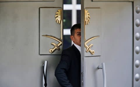 A security guard walks into the Saudi Arabian consulate in Istanbul, Turkey - Credit: AP