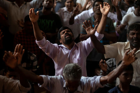 Members of Zion Church, which was bombed on Easter Sunday, pray at a community hall in Batticaloa, Sri Lanka, May 5, 2019. REUTERS/Danish Siddiqui