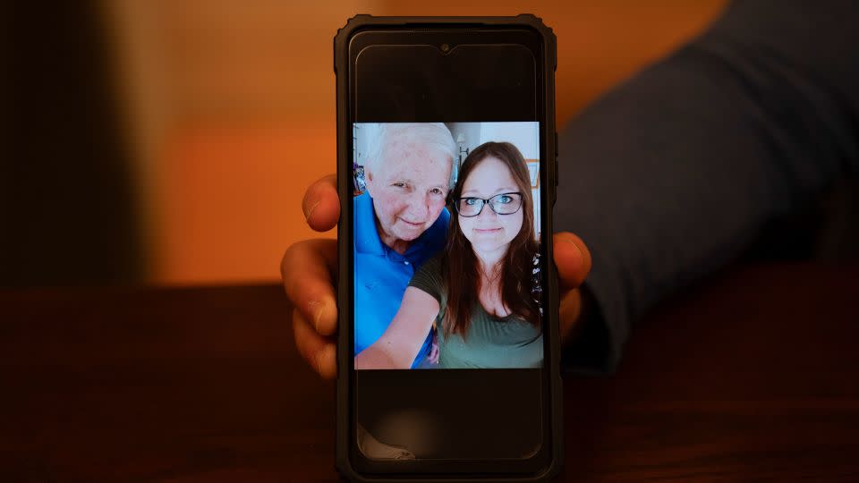 Janine Pierson displays a selfie she took with Caldwell on her phone in Hartford, Connecticut. Pierson took the photo during a visit with Caldwell in 2022 and it is the only photograph she has with him. - Laura Oliverio/CNN