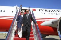 <p>Turkey’s President Recep Tayyip Erdogan and his wife Emine disembark from a plane after arriving in Washington, Monday, May 15, 2017. Erdogan is scheduled to meet U.S. President Donald Trump on Tuesday for talks expected to center on the friction between the two NATO allies over a U.S. decision to arm Syrian Kurdish fighters considered as terrorists by Turkey. (Presidency Press Service/Pool photo via AP) </p>