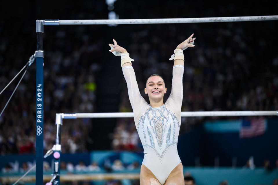 Giorgia Villa of Team Italy competes in the uneven bars competition.