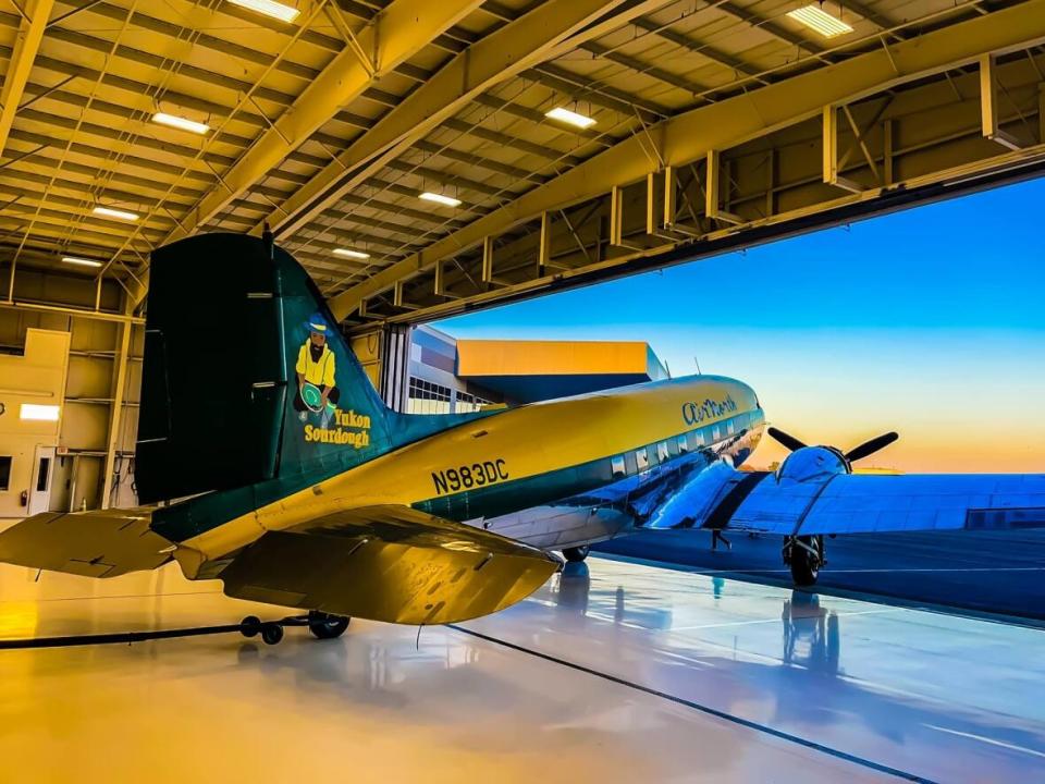 The restored Air North DC-3 in a hangar in Hagerstown, Maryland. (Air North DC-3 Yukon Sourdough/Facebook - image credit)