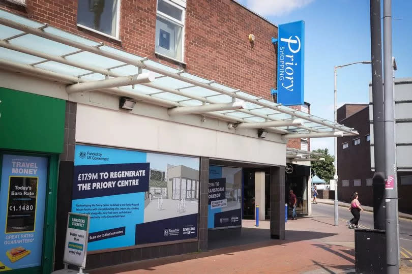 A unit at the Priory Shopping Centre advertising its upcoming transformation