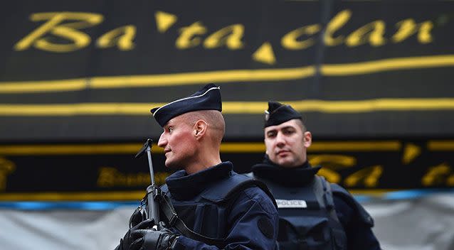 French police officers stand guard in front of the main entrance of Bataclan concert hall following Friday's terrorist attacks. Source: Getty