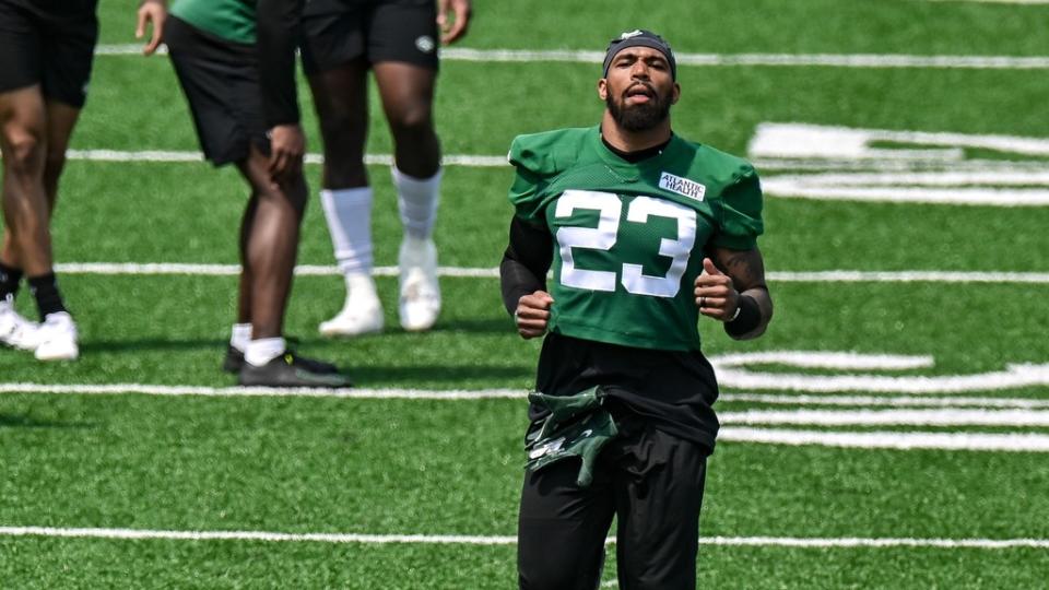 May 23, 2023; Florham Park, NJ, USA; New York Jets safety Chuck Clark (23) warms up during OTA s at Atlantic Health Jets Training Center.