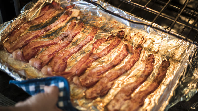 Bacon on aluminium foil in oven 