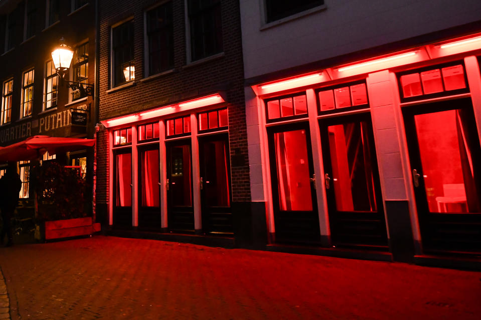 AMSTERDAM, NETHERLANDS - DECEMBER 10: General view of Red Light District on December 10, 2022 in Amsterdam, Netherlands.De Wallen, Amsterdam's red-light district, is internationally known and one of the main tourist attractions of the city. It offers legal prostitution and a number of coffee shops that sell marijuana. (Photo by Stefano Guidi/Getty Images)