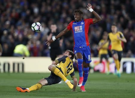 Britain Football Soccer - Crystal Palace v Arsenal - Premier League - Selhurst Park - 10/4/17 Arsenal's Nacho Monreal in action with Crystal Palace's Wilfried Zaha Reuters / Stefan Wermuth Livepic .