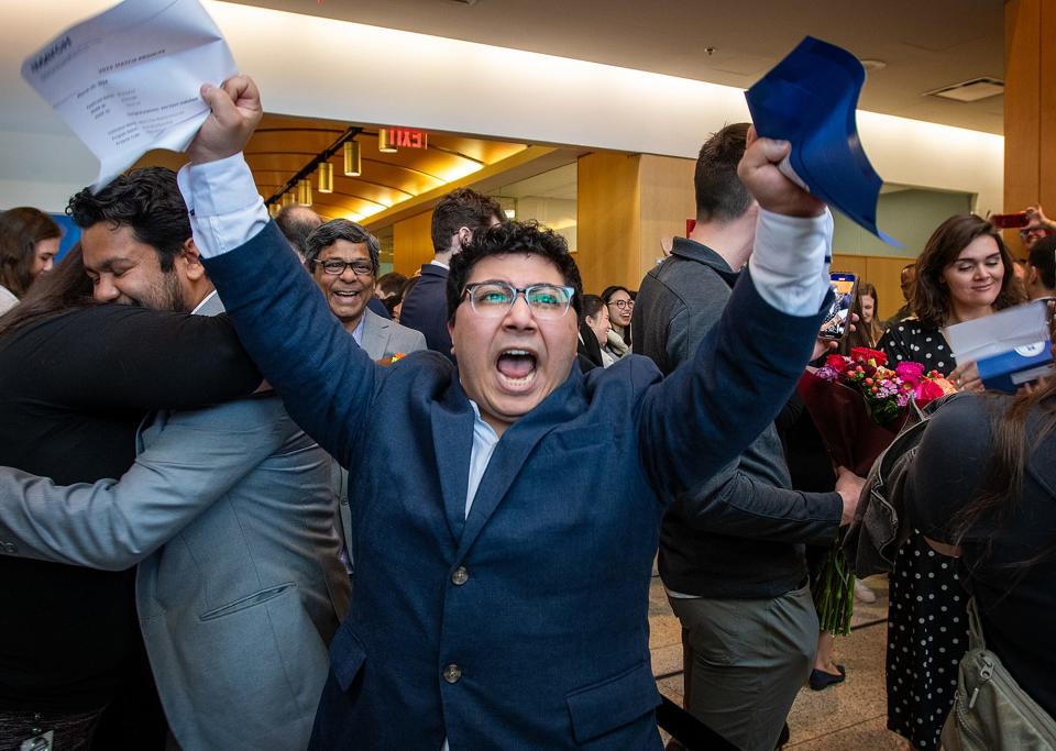 Medical student Mina Botros reacts to finding out where he will spend his residency during Match Day at UMass Chan Medical School.