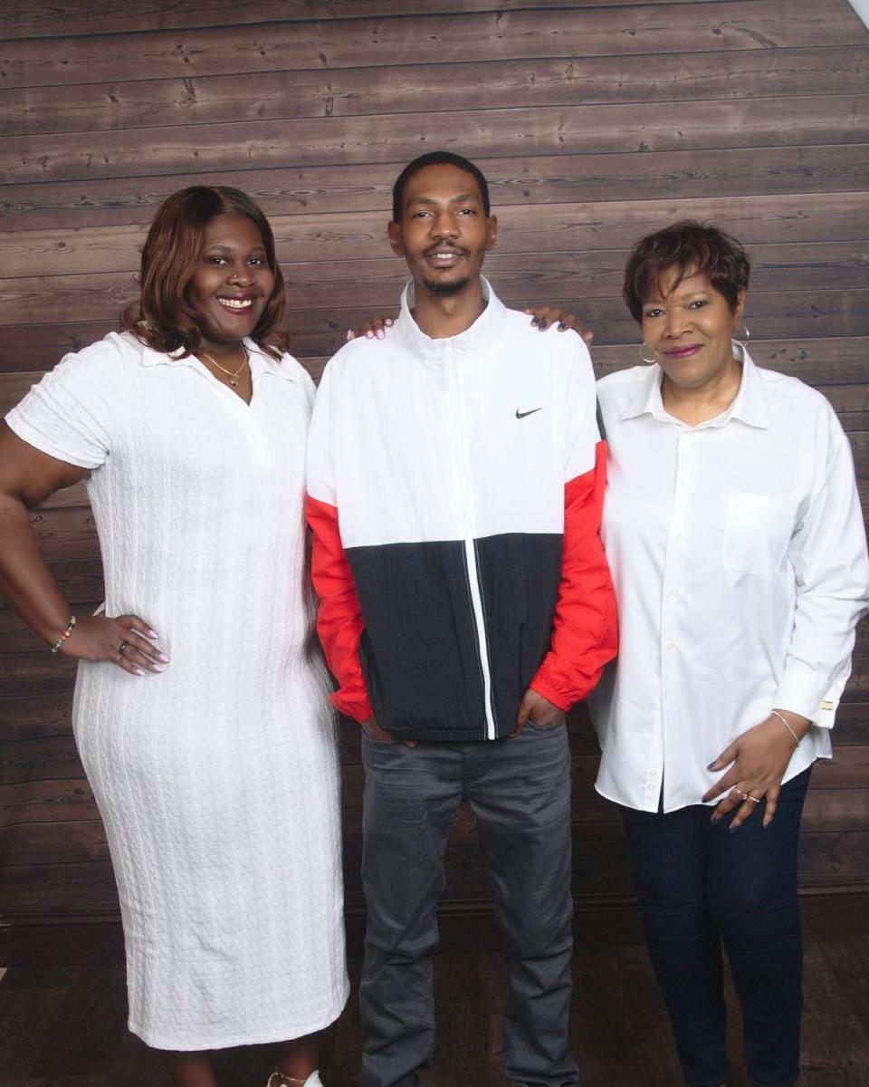 Jayland Walker with his mother, Pamela, right, and sister, Jada.