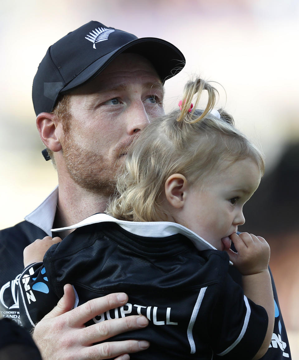 New Zealand's Martin Guptill reacts at the end of the Cricket World Cup final match between England and New Zealand at Lord's cricket ground in London, Sunday, July 14, 2019. England won after a super over after the scores ended tied after 50 overs each. (AP Photo/Alastair Grant)