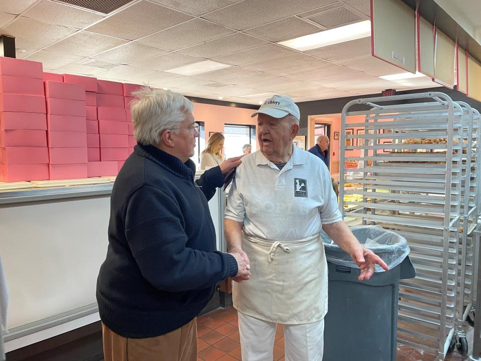 Tony Weibl, right, who was born in Yugoslavia, fled with his family in 1944 to Germany, where he spent the late part of his childhood. He wanted to become an attorney, but ended up a baker, which is just fine with him. One frequent customer says, “Nowhere else in Ohio has an old German guy making Austria rolls like Tony.”