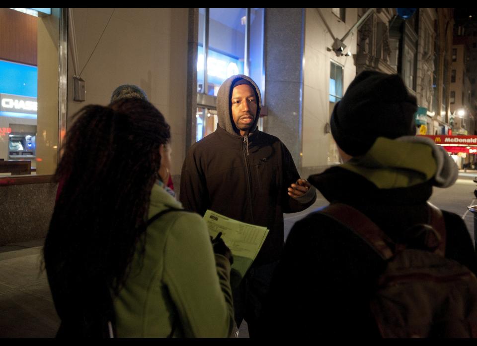 Jozlyn McCaw, left along with teammate Victoria Muhlamie, right speak to Jamie Rozzell  during a homeless count in the borough of Manhattan. The New York City Department of Homeless Services assisted by volunteers put on a homeless count in the borough of Manhattan's Murray Hill neighborhood Jan. 30, 2012. (Damon Dahlen, AOL)