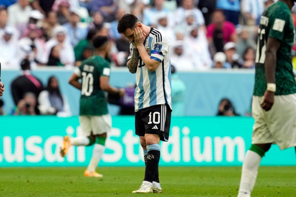 Lionel Messi reacts to Argentina’s struggles against Saudi Arabia (The Associated Press)