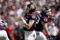 Texas A&M quarterback Zach Calzada (10) pass down field against New Mexico during the first half of an NCAA college football game on Saturday, Sept. 18, 2021, in College Station, Texas. (AP Photo/Sam Craft)