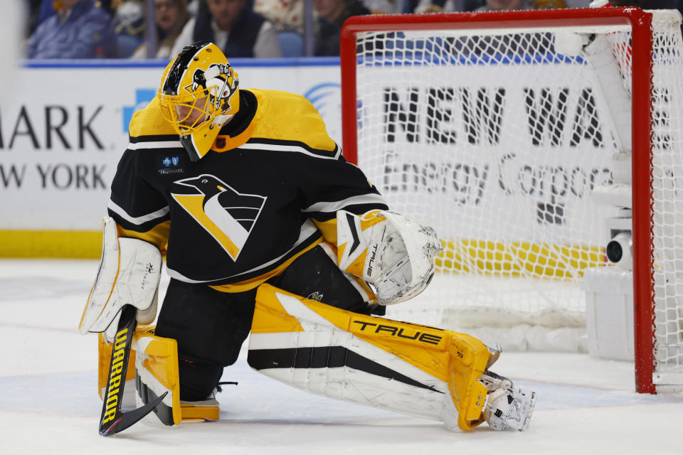 Pittsburgh Penguins goaltender Casey DeSmith makes a pad save during the first period of the team's NHL hockey game against the Buffalo Sabres, Wednesday, Nov. 2, 2022, in Buffalo, N.Y. (AP Photo/Jeffrey T. Barnes)