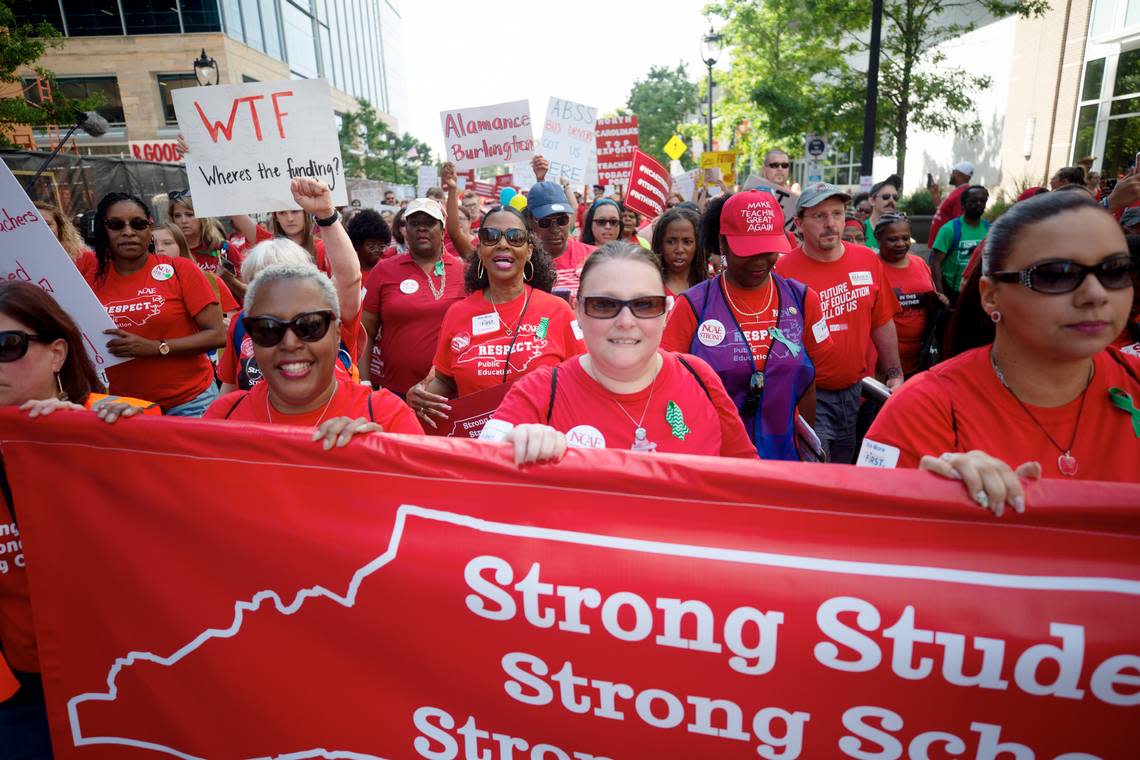 Thousands marched down Fayetteville St. in downtown Raleigh on Wednesday, May 1, 2019 to demand more funding from state lawmakers for public education.