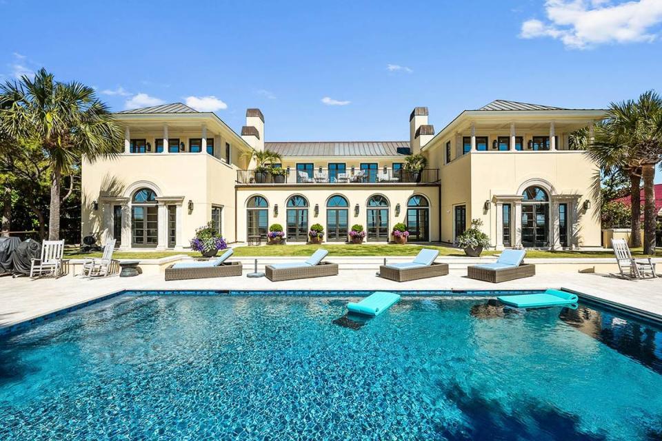 An image of a swimming pool behind a $16.4 million home for sale in Kiawah. Kiawah Island Real Estate/Courtesy of Kiawah Island Real Estate