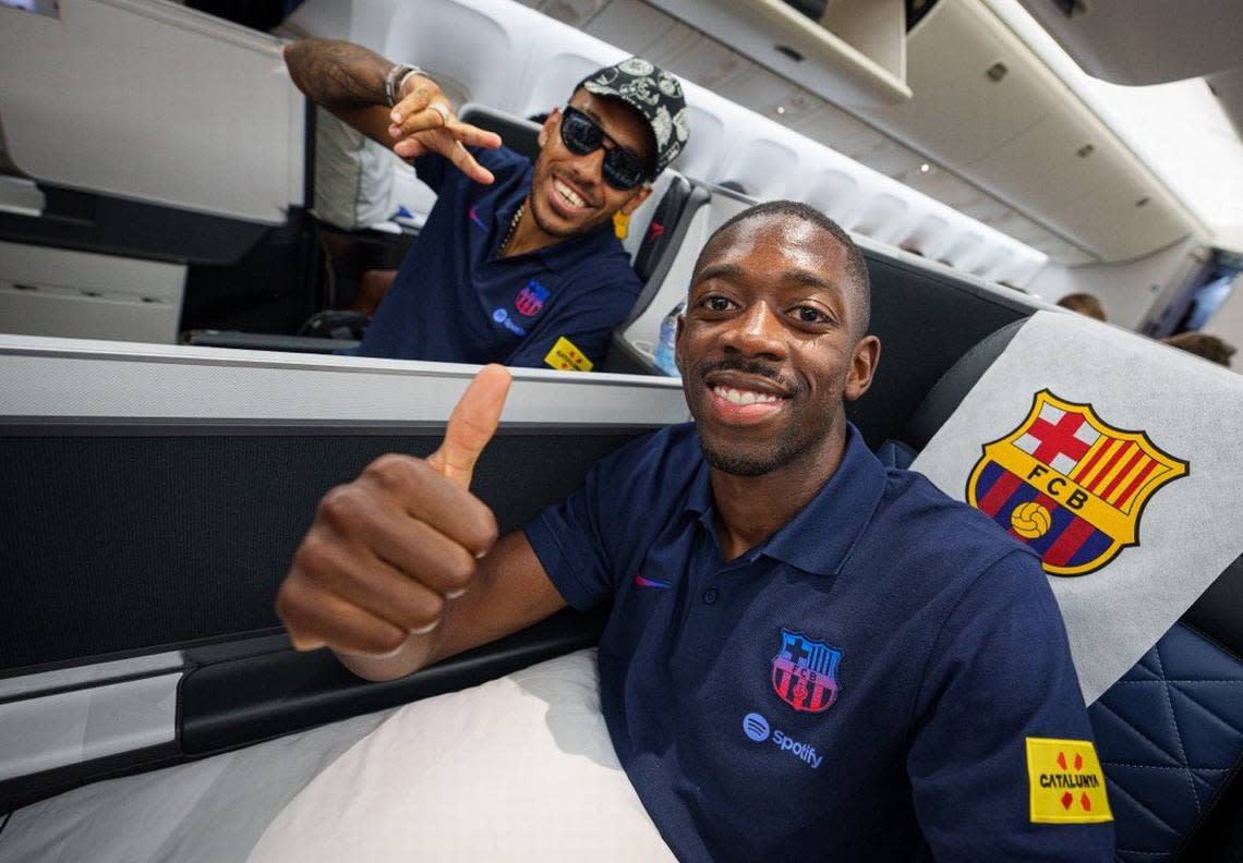 FC Barcelona players Pierre Emerick Aubameyang (top) and Ousmane Dembele on a flight to Fort Lauderdale on July 16, 2022 to kick off the club’s summer tour with a friendly against Inter Miami.