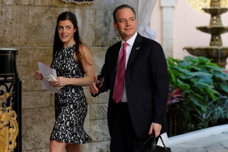 Reince Priebus (R), chief of staff to U.S. President-elect Donald Trump, walks with a staff member as he arrives to attend meetings with Trump at the Mar-a-lago Club in Palm Beach, Florida, U.S. December 28, 2016. REUTERS/Jonathan Ernst