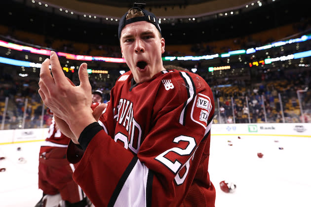 BOSTON, MA – FEBRUARY 13: Jacob Olson #26 of the Harvard Crimson celebrates after defeating the Boston University Terriers 6-3 in the 2017 Beanpot Tournament Championship at TD Garden on February 13, 2017 in Boston, Massachusetts. (Photo by Maddie Meyer/Getty Images)