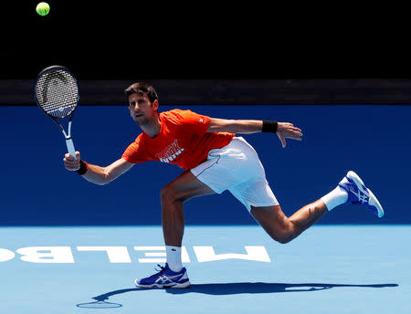 Tennis - Australian Open - Melbourne Park, Melbourne, Australia - January 10, 2019 - Serbia's Novak Djokovic at a practice match against Britain's Andy Murray. REUTERS/Kim Kyung-Hoon