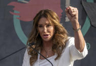 FILE - In this Jan. 18, 2020, file photo, Caitlyn Jenner speaks at the fourth Women's March in Los Angeles. Jenner, a Republican candidate for California governor, is offering mixed messages about her voting record as she told CNN that she did not vote in the 2020 election, but Los Angeles County records show she did. A fading coronavirus crisis and an astounding windfall of tax dollars have reshuffled California's emerging recall election, allowing Democratic Gov. Gavin Newsom to talk of a mask-free future and propose billions in new spending for schools and businesses as he looks to fend off Republicans who depict him as a foppish failure. (AP Photo/Damian Dovarganes, File)