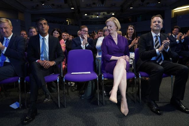 Left to right, Rishi Sunak, Liz Truss, and her husband Hugh O’Leary, at the Queen Elizabeth II Centre in London ahead of the announcement that Ms Truss is the new Conservative Party leader and will become the next prime minister
