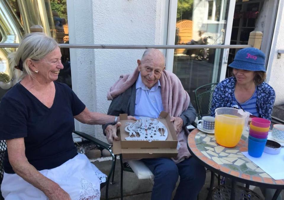 John was gifted a special clock (The Hollies Rest Home)