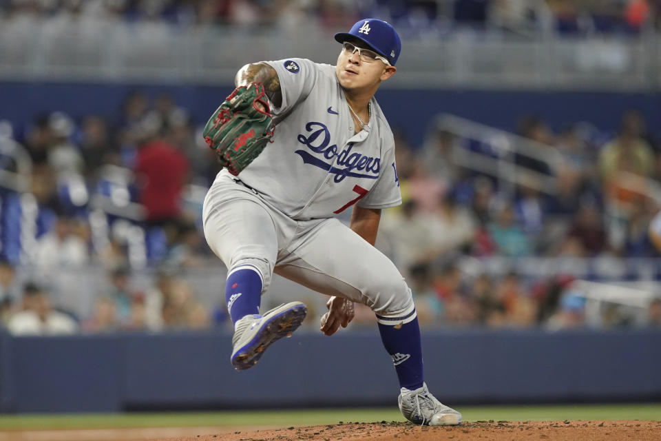 Los Angeles Dodgers starting pitcher Julio Urias (7) aims a pitch in the first inning of a baseball game against the Miami Marlins, Sunday, Aug. 28, 2022, in Miami. The Dodgers defeated the Marlins 8-1. (AP Photo/Marta Lavandier)