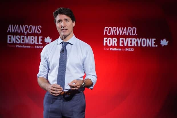 Liberal Leader Justin Trudeau reveals his party's election platform in Toronto on Wednesday. The Liberals say they want to ban blind bidding on home sales, claiming it drives up prices.  (Nathan Denette/The Canadian Press - image credit)