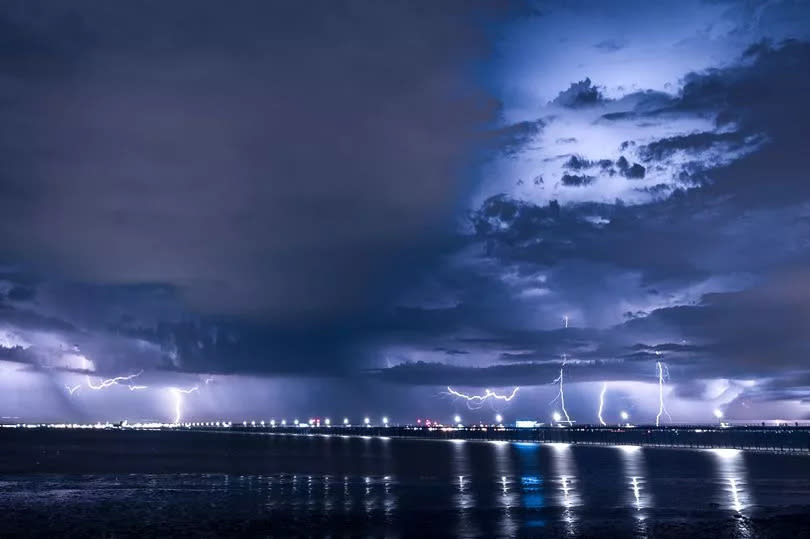 Southend coastline is shown with lightning and dark clouds