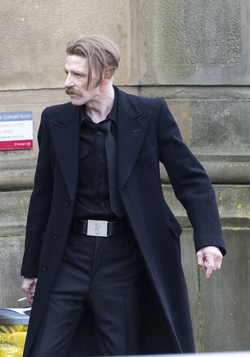 Paul Anderson, who plays Arthur Shelby, takes a break from filming. Peaky Blinders start filming in Liverpool, at St George's Hall, as season 6 gets underway, pictured in Liverpool city centre, March 4 2021. (SWNS)