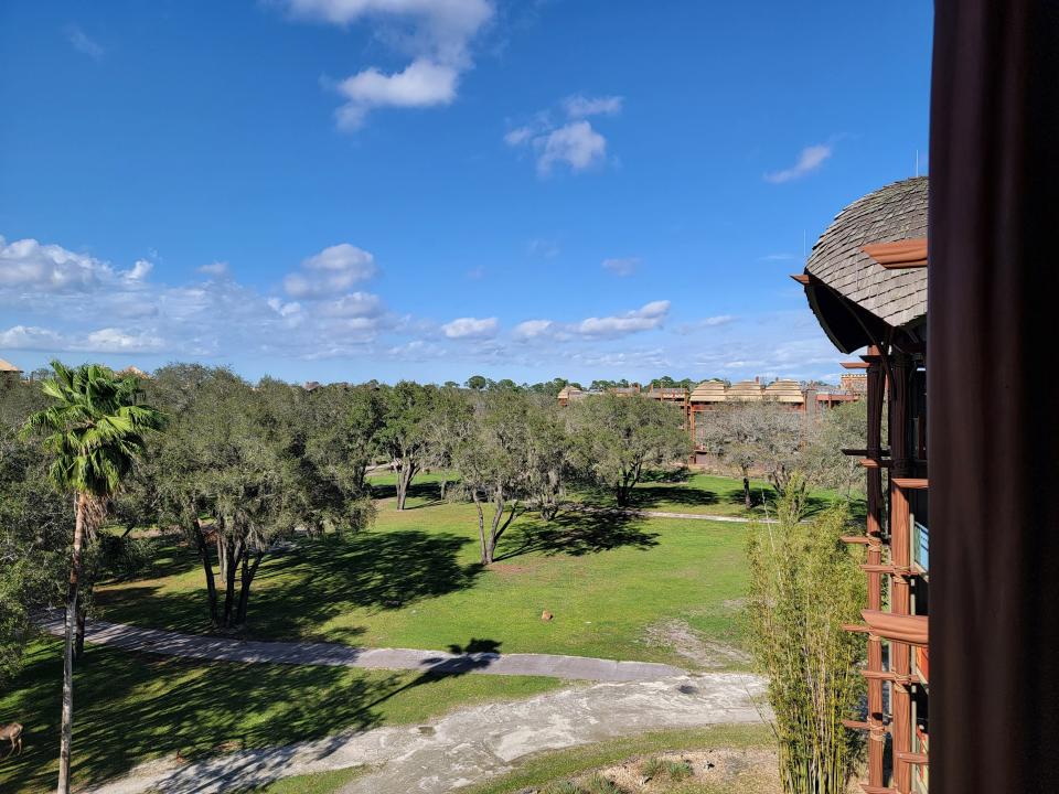 the grounds of the animal kingdom lodge from a savanna view room