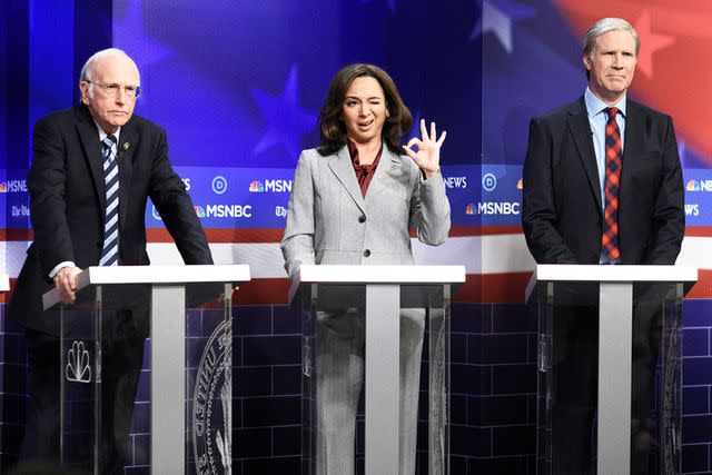 <p>Will Heath/NBC/NBCU Photo Bank/Getty</p> (L-R) Larry David as Bernie Sanders, Maya Rudolph as Kamala Harris, and host Will Ferrell as Tom Steyer during the Democratic Debate sketch on Saturday, November 23, 2019.