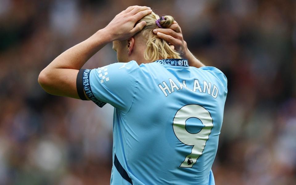 Manchester City's Erling Haaland reacts after a missed chance