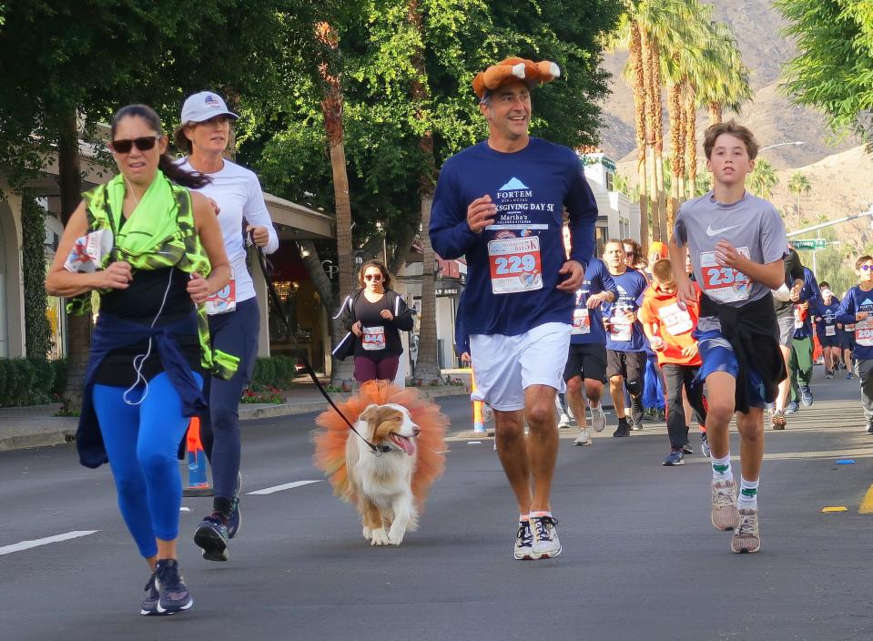 A four-legged participant dons one of Martha's famous Thanksgiving tutus.