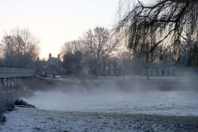 The sun rises over the River Thames at Benson Lock in Oxfordshire  (Steve Parsons/PA)