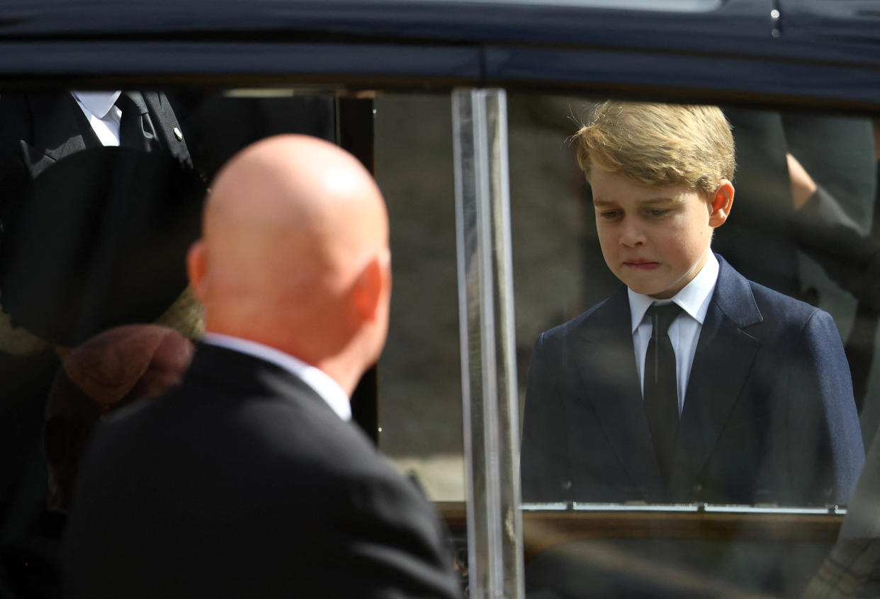 LONDON, ENGLAND - SEPTEMBER 19: Prince George walks next to a car after a service at Westminster Abbey on the day of the state funeral and burial of Queen Elizabeth at Westminster Abbey on September 19, 2022 in London, England. /(Photo by Hannah McKay - WPA Pool/Getty Images)