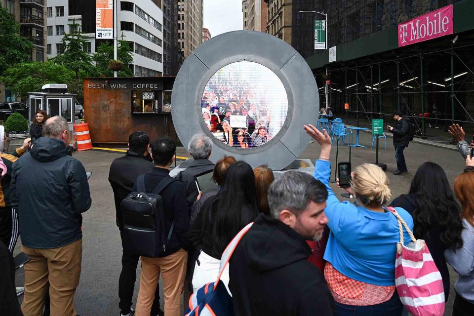 <p>Press Association via AP Images</p> A photo of the livestream video portal connecting New York City and Dublin
