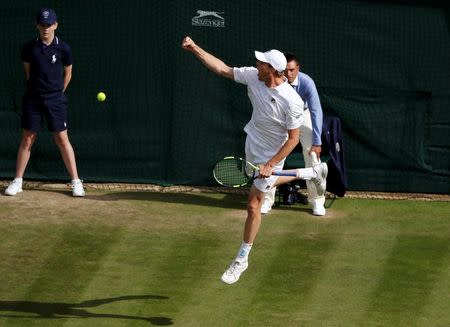 Britain Tennis - Wimbledon - All England Lawn Tennis & Croquet Club, Wimbledon, England - 2/7/16 USA's Sam Querrey celebrates winning his match against Serbia's Novak Djokovic REUTERS/Stefan Wermuth