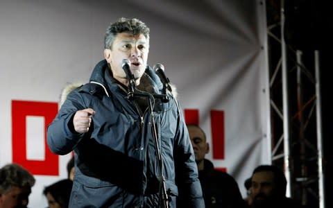 Boris Nemtsov speaks at a protest against Vladimir Putin in 2012 - Credit: Alexander Zemlianichenko Jr/Bloomberg