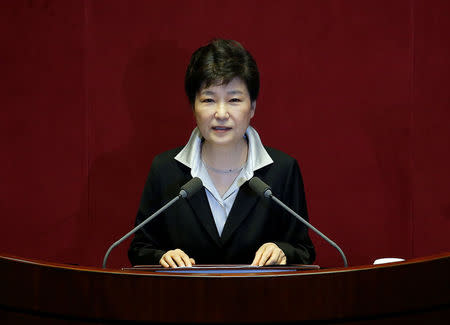 South Korean President Park Geun-hye delivers her speech on the 2017 budget bill during a plenary session at the National Assembly in Seoul, South Korea, October 24, 2016. REUTERS/Kim Hong-Ji
