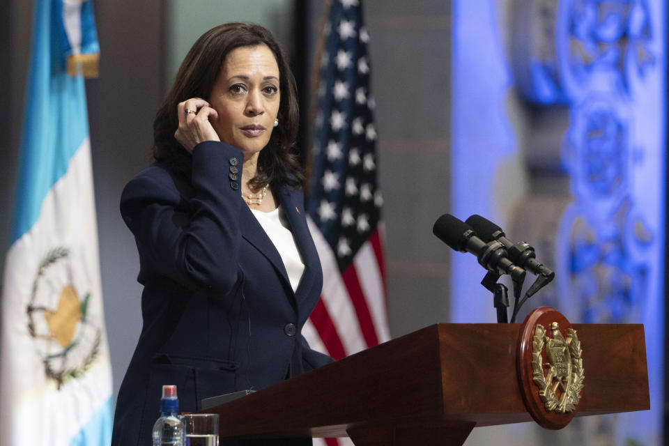 FILE - Vice President Kamala Harris, left, and Guatemalan President Alejandro Giammattei, (unseen) attend a news conference, Monday, June 7, 2021, at the National Palace in Guatemala City. Harris on Monday, Dec. 13, 2021, is announcing $1.2 billion in commitments from international businesses to support the economies and social infrastructure of Central American nations, as she works to address what the White House terms the “root causes” of migration to the U.S. (AP Photo/Jacquelyn Martin, File)