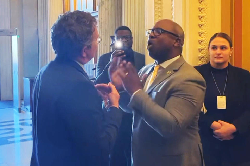 Rep. Jamaal Bowman, D-N.Y., speaks about gun violence to Rep. Thomas Massie, R-Ky., from left, at the U.S. Capitol, on Wednesday. (NBC News)