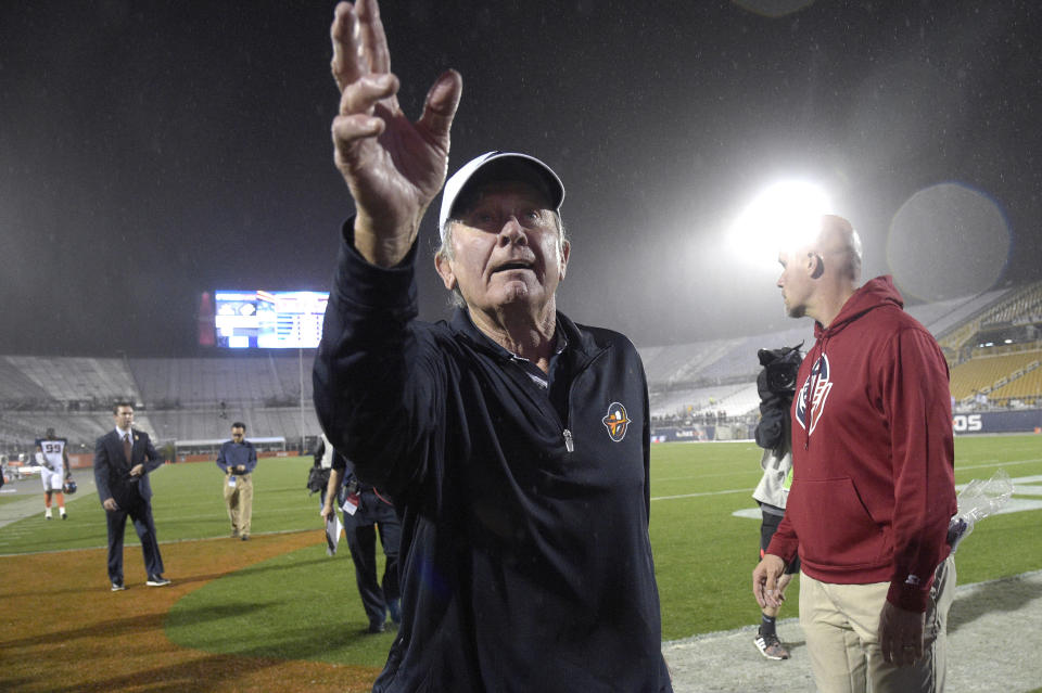 Orlando Apollos coach Steve Spurrier acknowledges fans in the stands after the team's Alliance of American Football game against the Atlanta Legends on Saturday, Feb. 9, 2019, in Orlando, Fla. (AP Photo/Phelan M. Ebenhack)