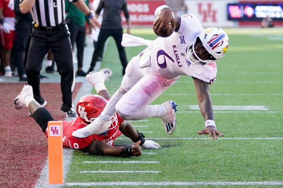 Kansas quarterback Jalon Daniels leaps into the end zone for a touchdown, one of the five he scored in Houston earlier this season.