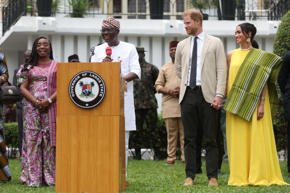 britains prince harry 2ndr, duke of sussex, and britains meghan r, duchess of sussex, react as lagos state governor, babajide sanwo olu 2ndl, gives a speech at the state governor house in lagos on may 12, 2024 as they visit nigeria as part of celebrations of invictus games anniversary photo by kola sulaimon afp photo by kola sulaimonafp via getty images