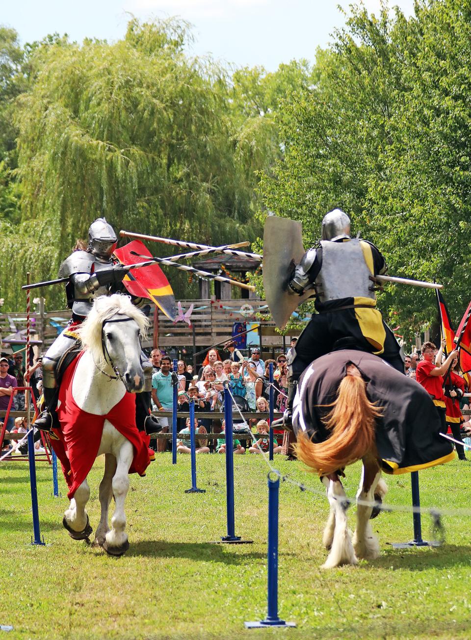 Sir Daniel (left) and Sir Logan joust during the first weekend of the 17th Annual Des Moines Renaissance Faire at Sleepy Hollow’s Castle Park, 4051 Dean Ave., in Des Moines in 2022.